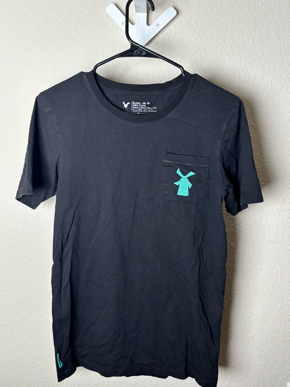 Dutch Bros Black Short Sleeve Pocket Tee with Teal Windmill